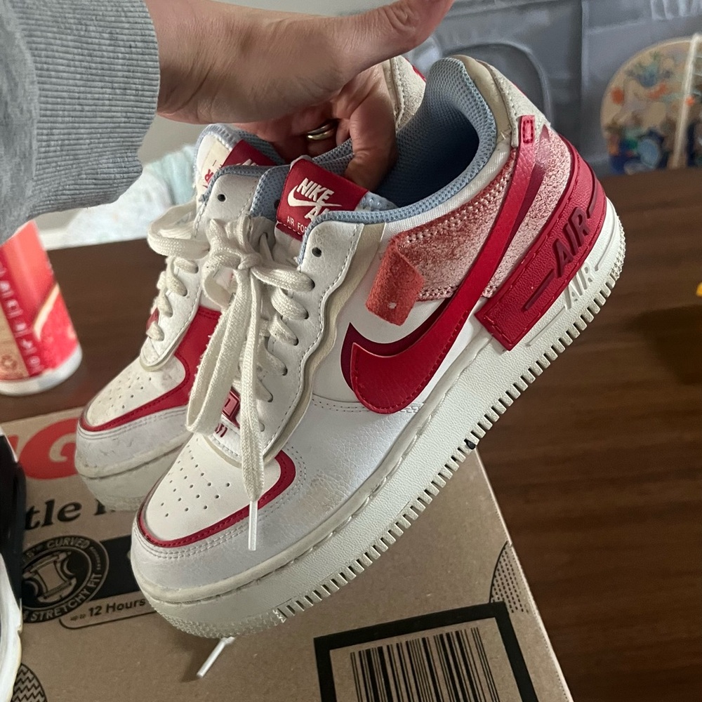 Red Nike Airforce women's 7.5 a little dirty, but haven't tried to clean